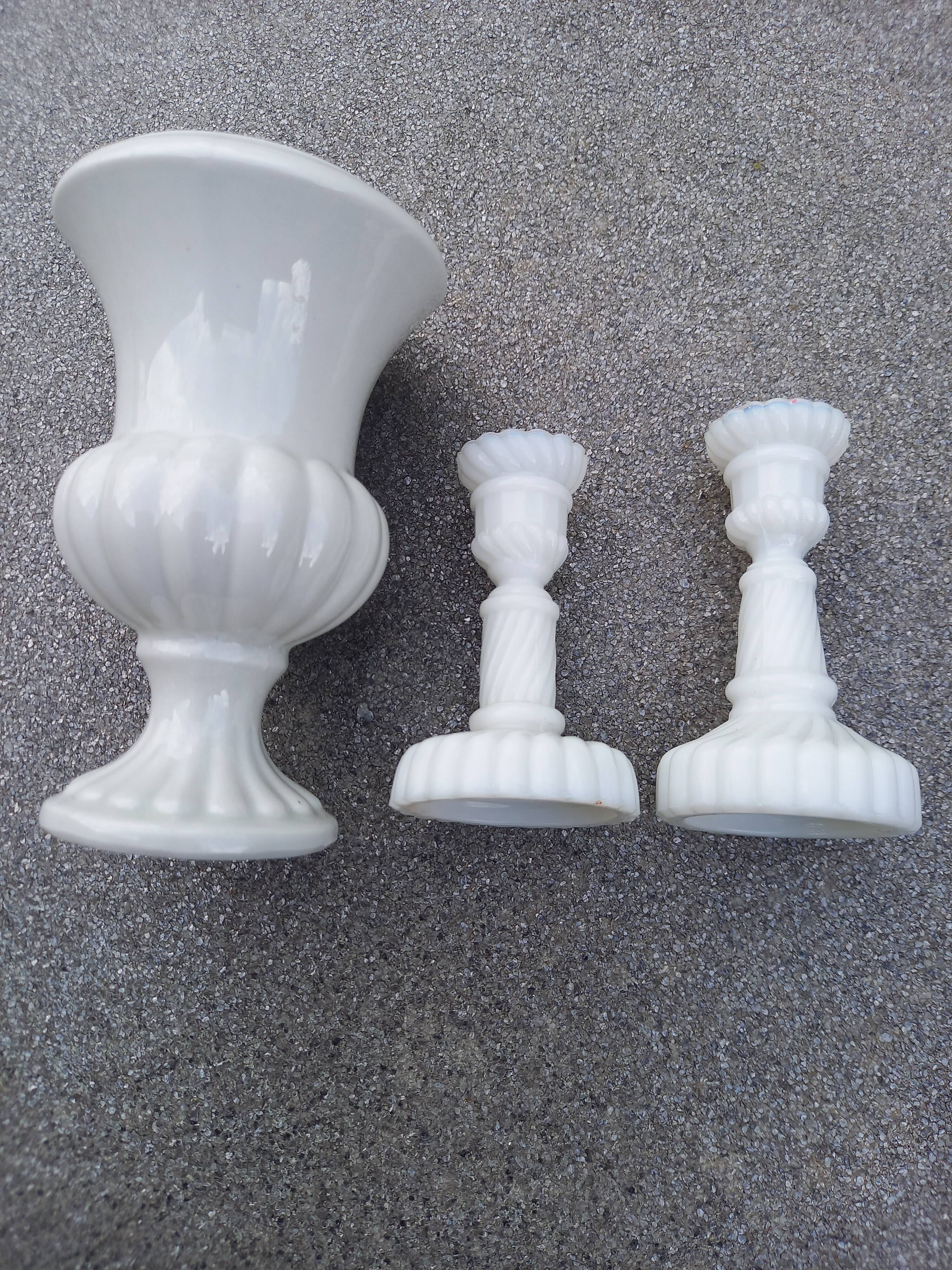 2 candle holders and earthenware vase