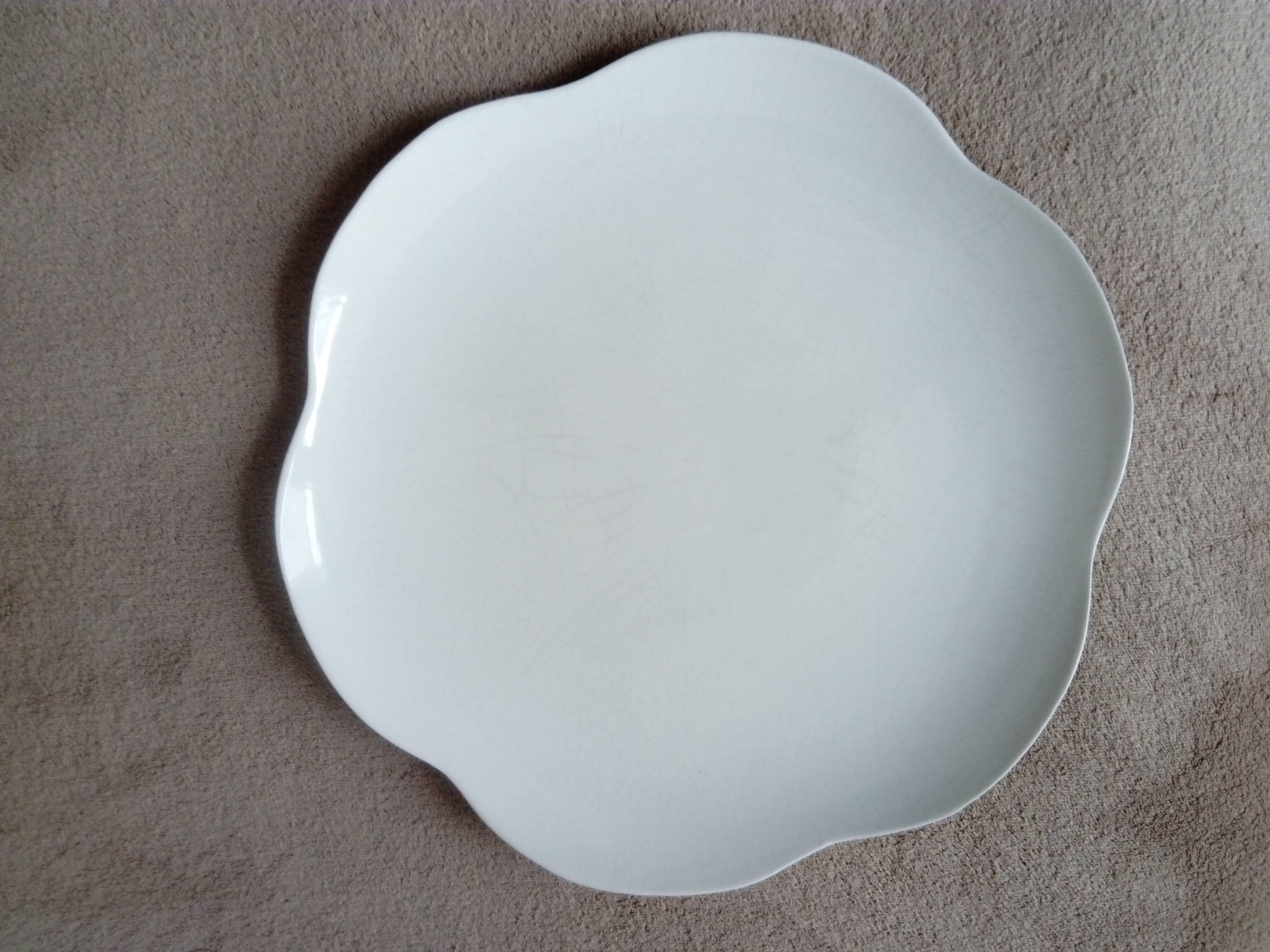 Large white multi-lobed pie or cake dish