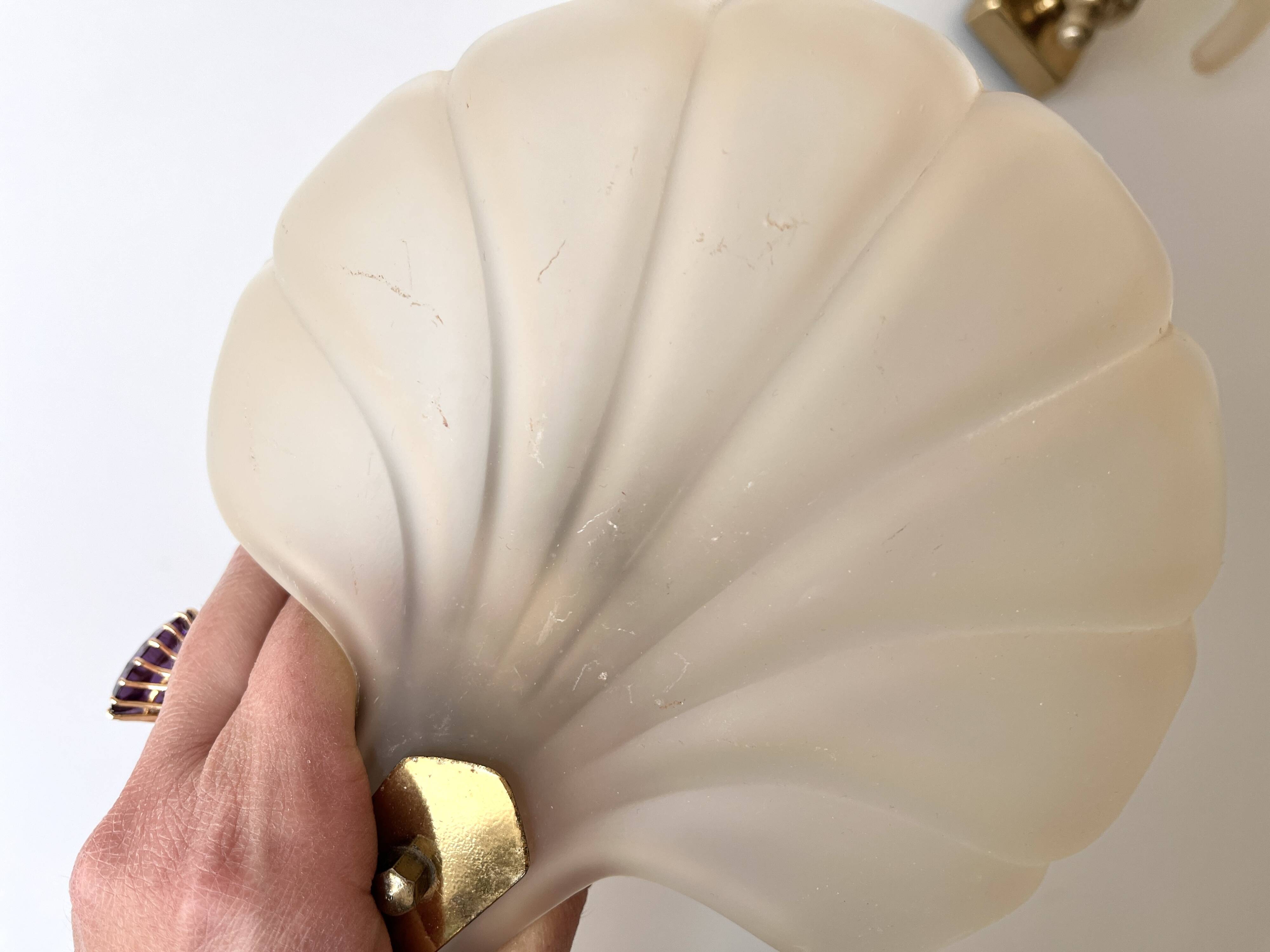 Pair of vintage shell glass wall lights, Art Deco style fixtures.