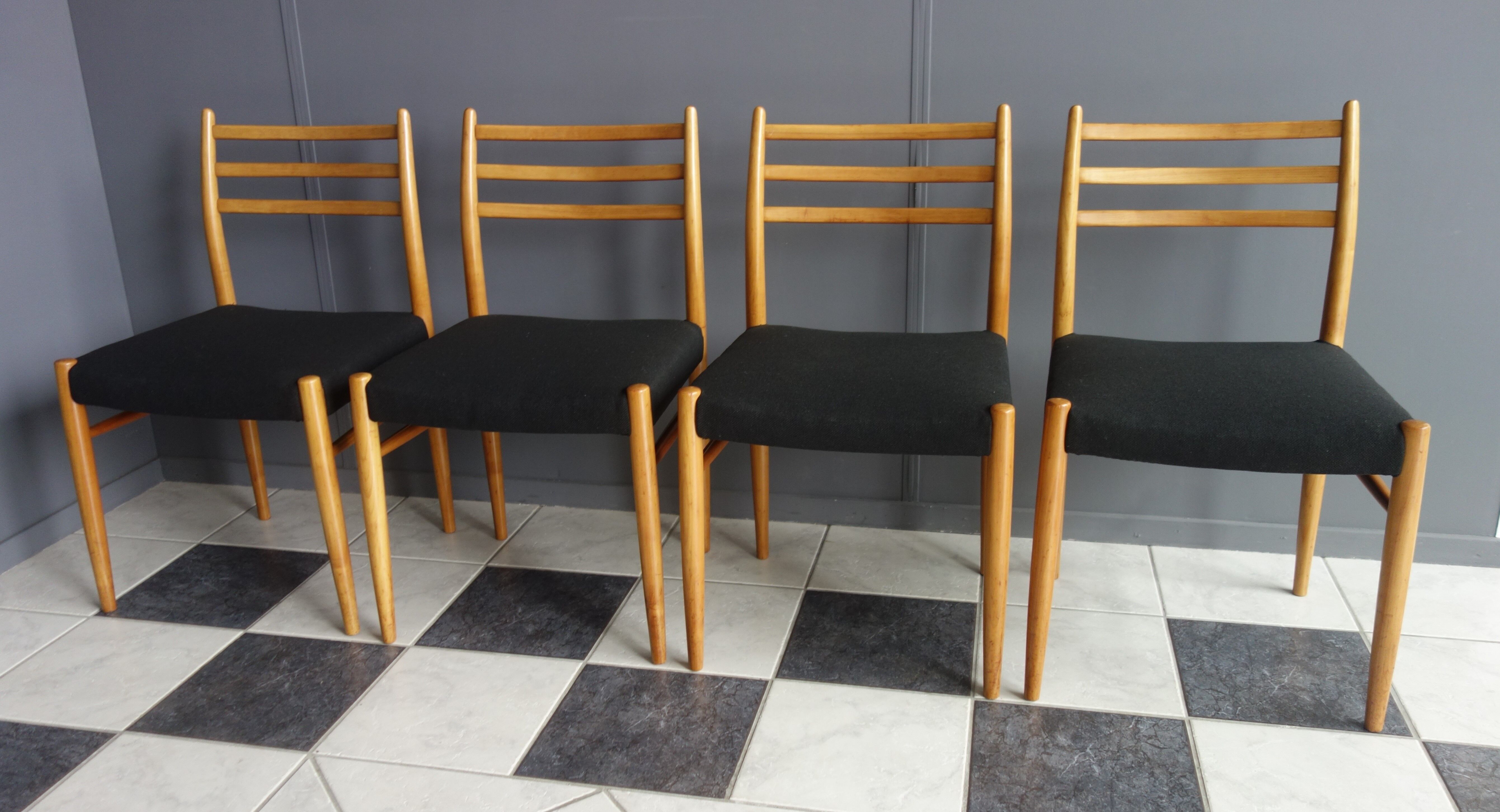Set of 4 dining chairs in wood and black fabric 1960s