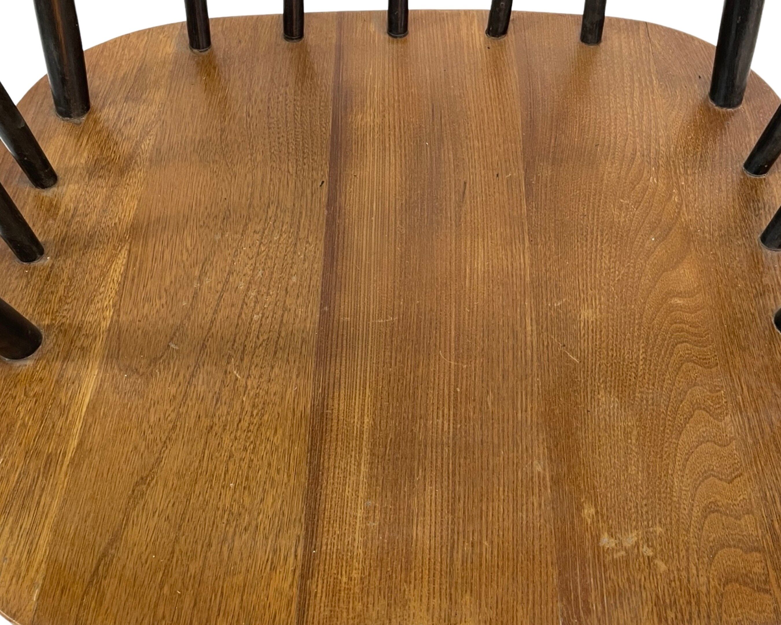Vintage easy chair with high back and armrest from the 60s
