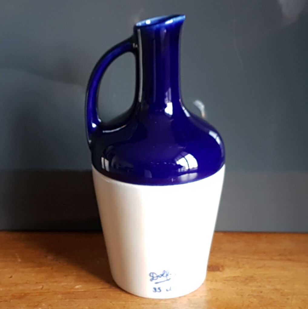 Old ceramic decanter Dolfi vase
