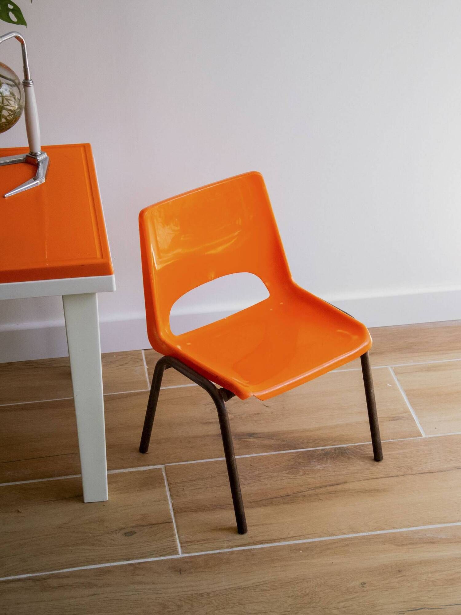 Vintage orange children's chair from the seventies.