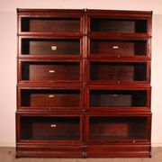 pair of Globe Wernicke London 'waterfall' bookcases in mahogany circa