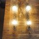 Pair of large Dallux wall lights attributed to Pierre Disderot.