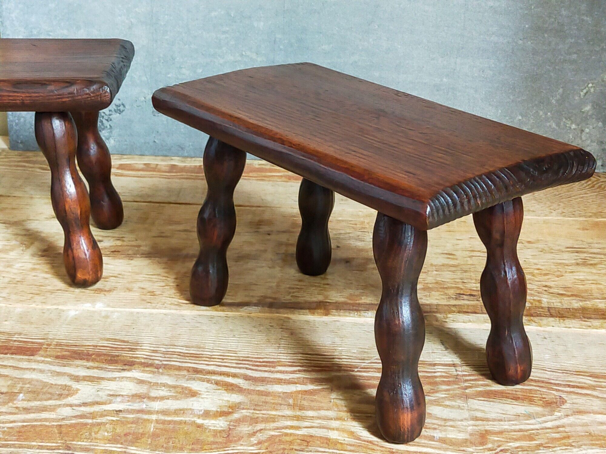 Pair of vintage solid turned wood footstools