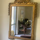 Miroir ancien en bois sculpté
