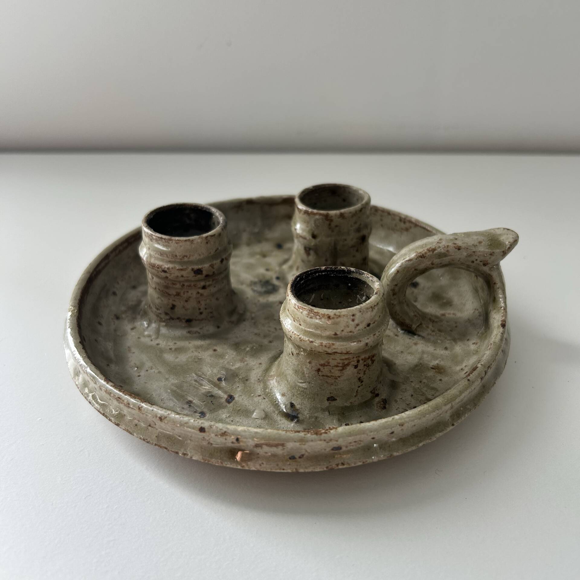 Unusual candlestick with 3 candle holders