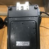 Black bakelite dial telephone with support