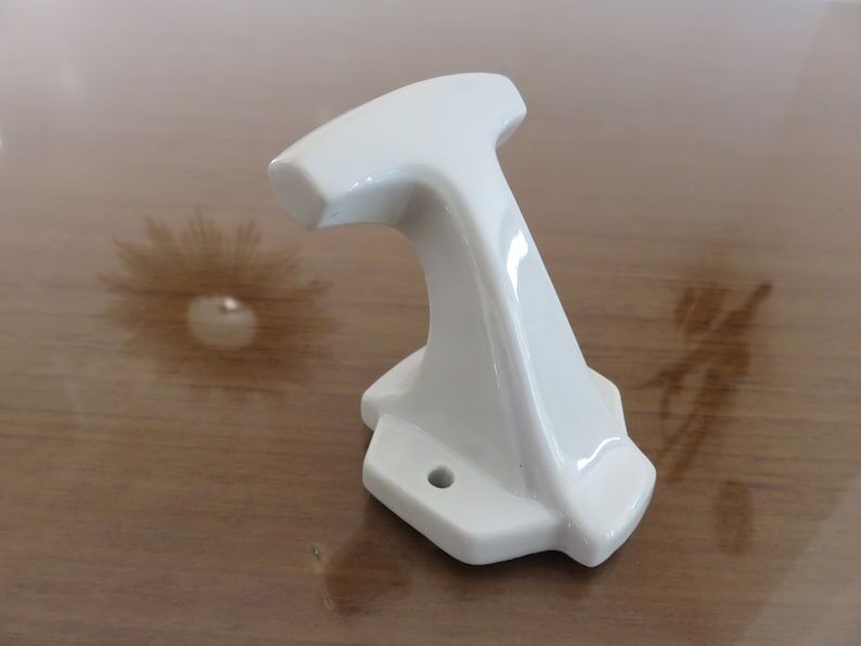 Old coat hook in white porcelain art deco years 30 40