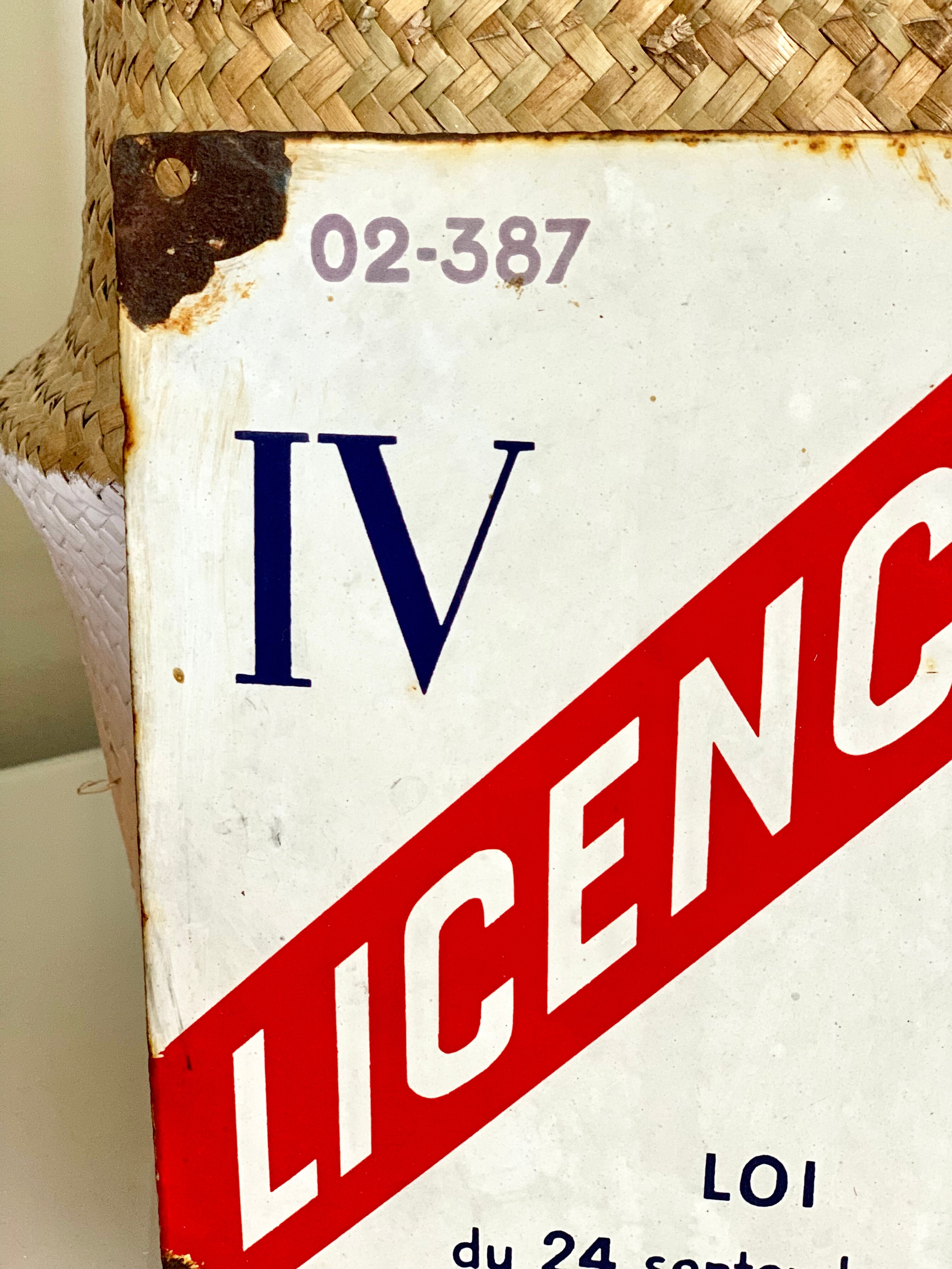 Old enamelled plate license IV