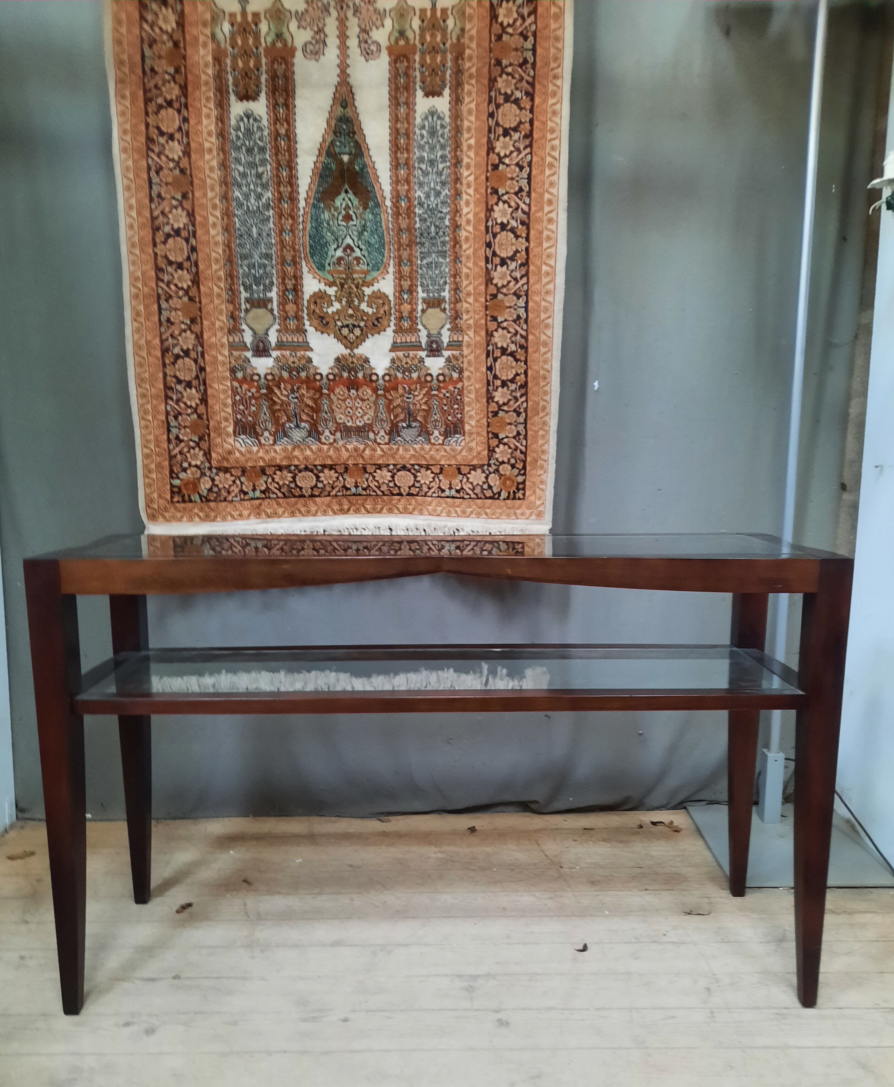 Contemporary console in varnished wood