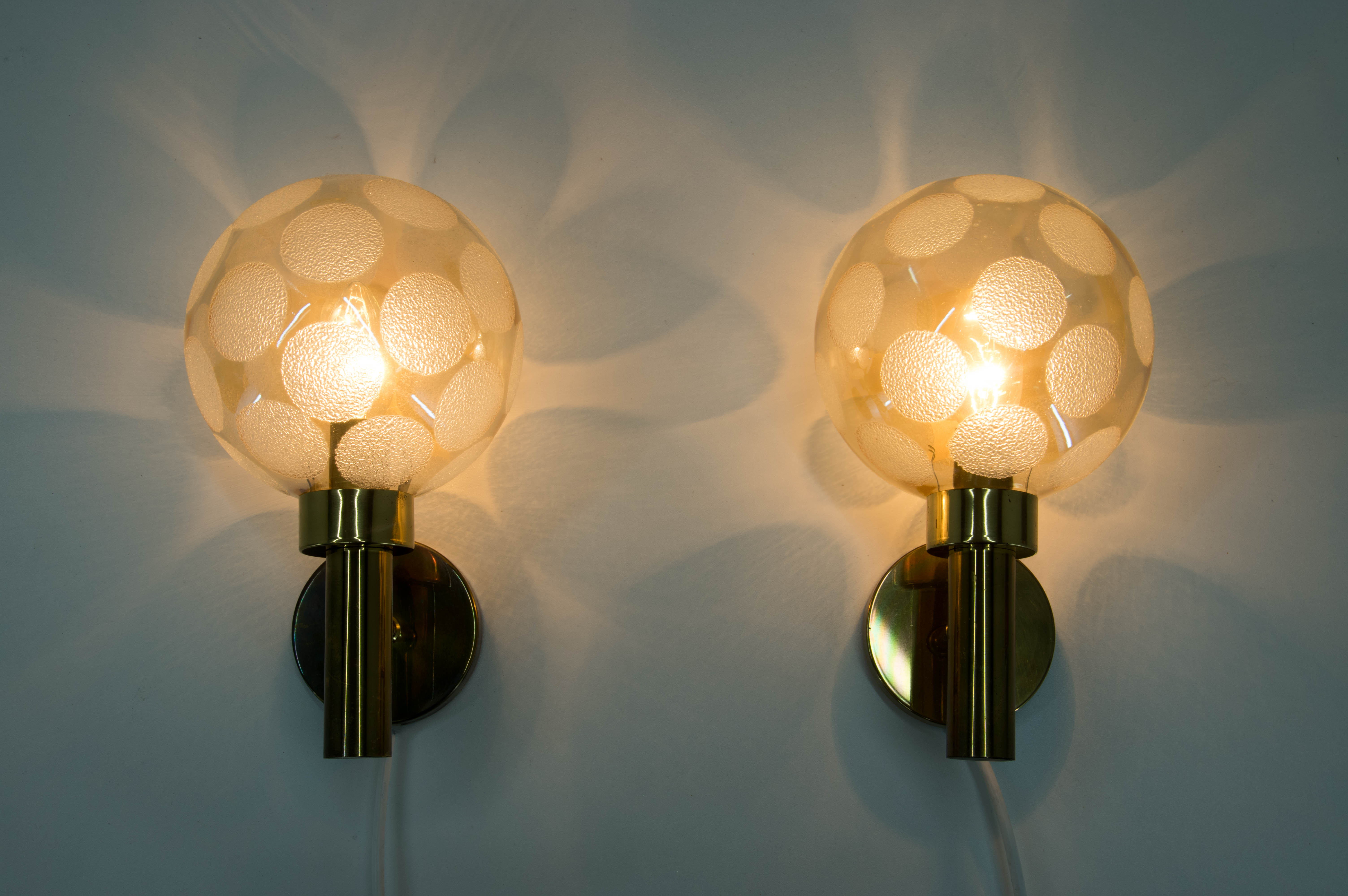Pair of brass and glass wall lamps, Denmark, 1970s