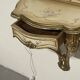 Pair of wall-mounted consoles with a mirror in Louis XV style.