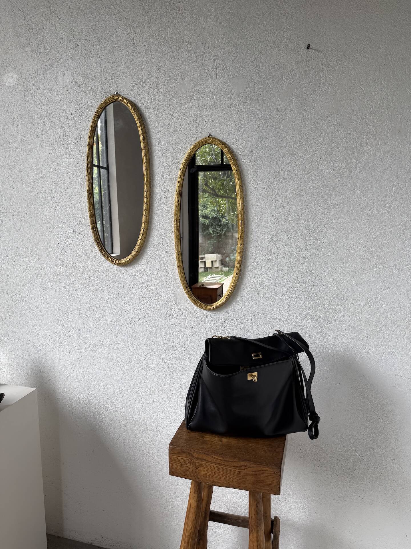 Pair of oval mirrors 1900 gilded stucco