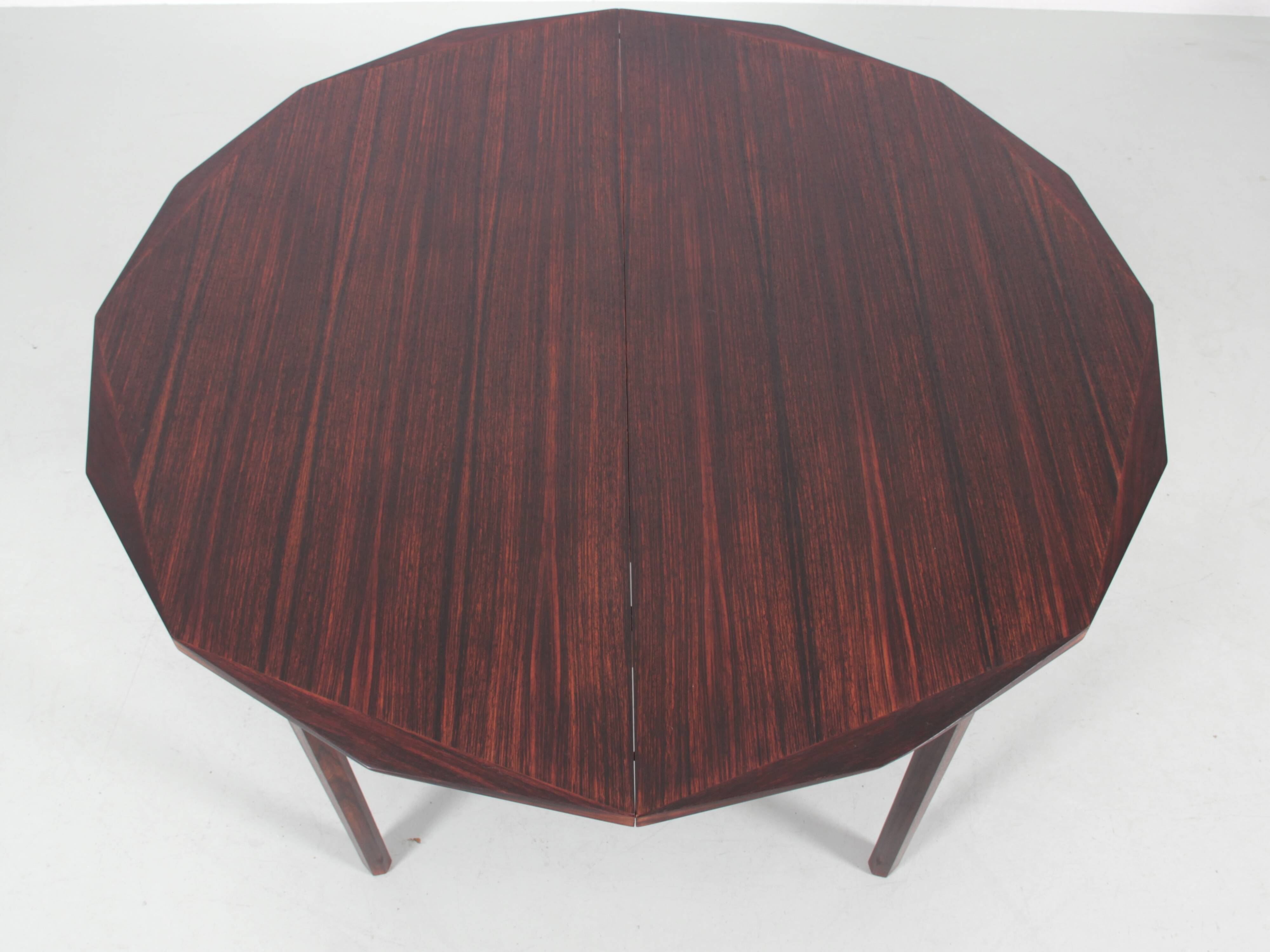 Rio rosewood dining table for 4/8 people.
