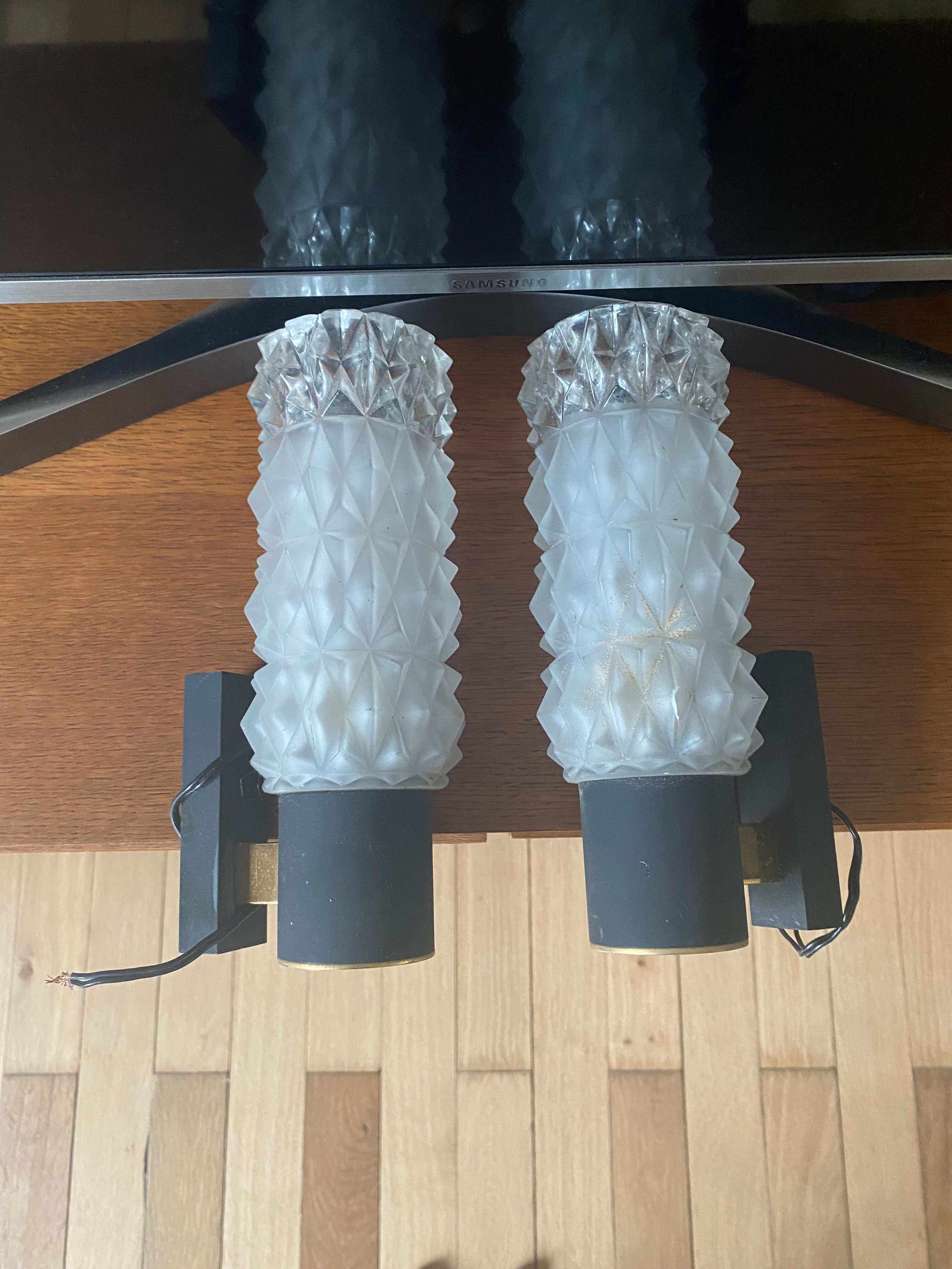 Pair of black and gold wall lamps  50