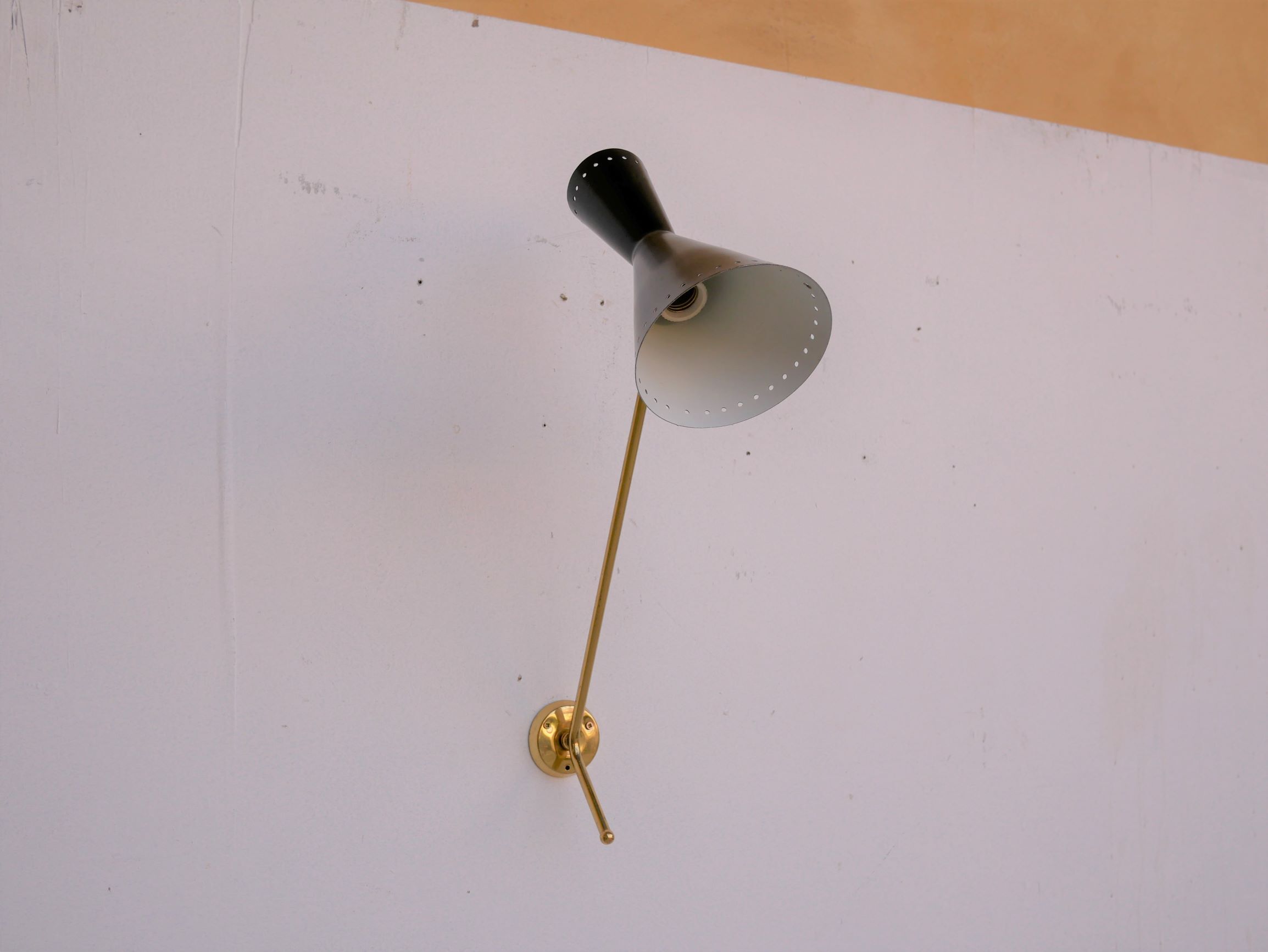 Vintage "Diabolo" wall apply in black metal and brass