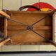 Old foldable fisherman's stool in wood and leather