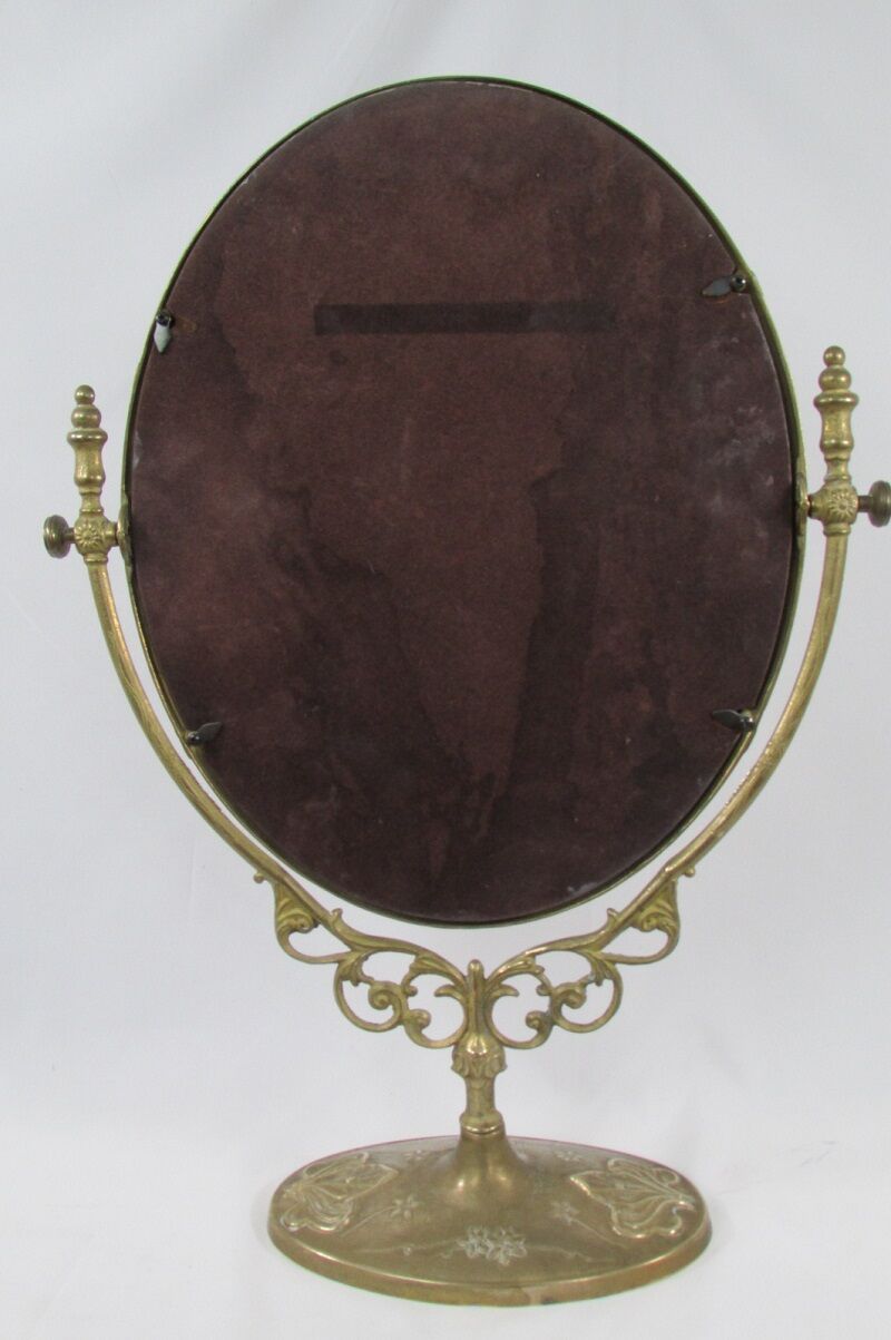 Tilting table mirror and art nouveau photo holder in bronze