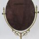 Tilting table mirror and art nouveau photo holder in bronze