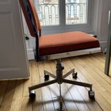 Orange office chair in 70s style