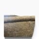 Vintage beige three-seater sofa with floral pattern and fringes.