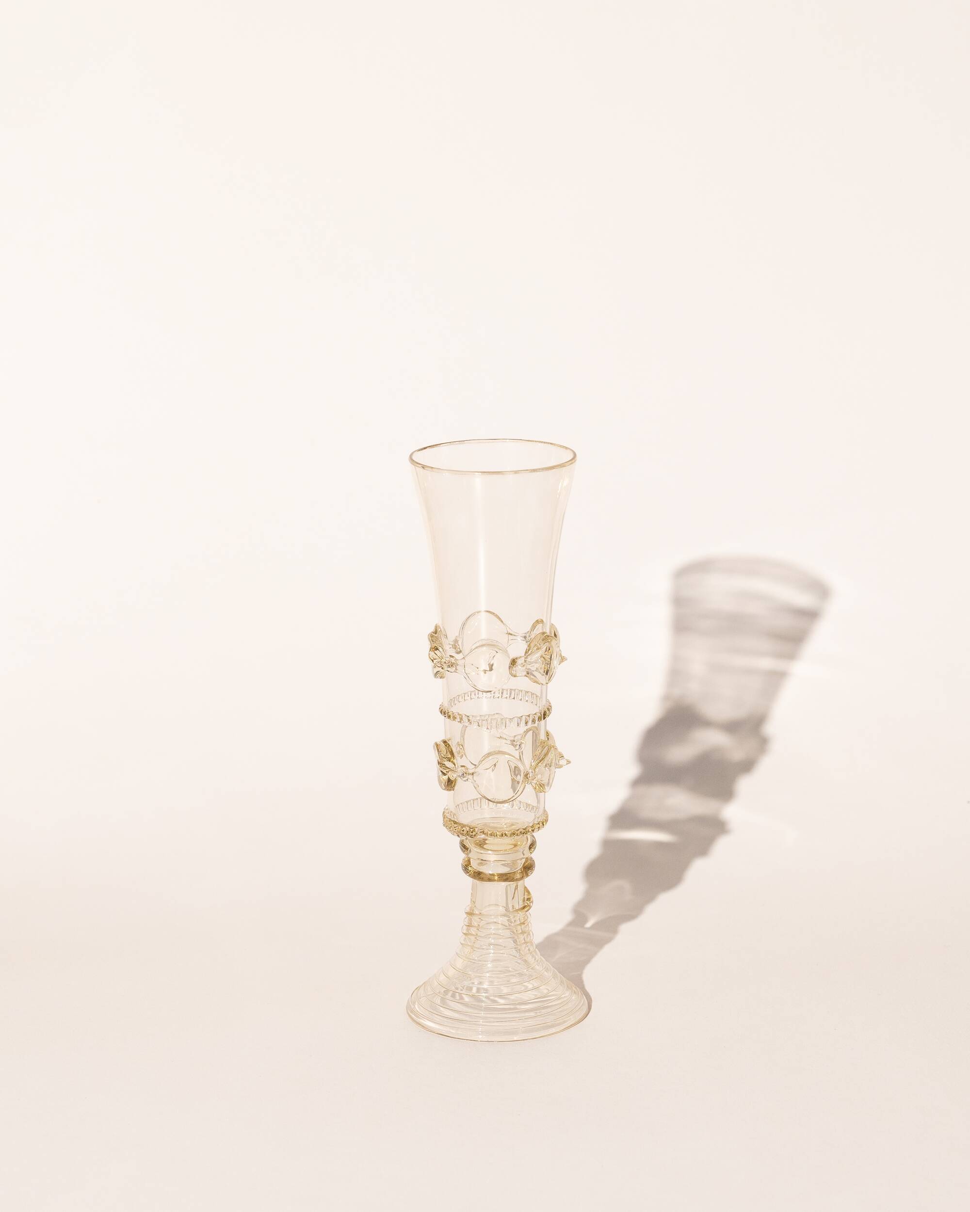 pair of green glass champagne flutes - points