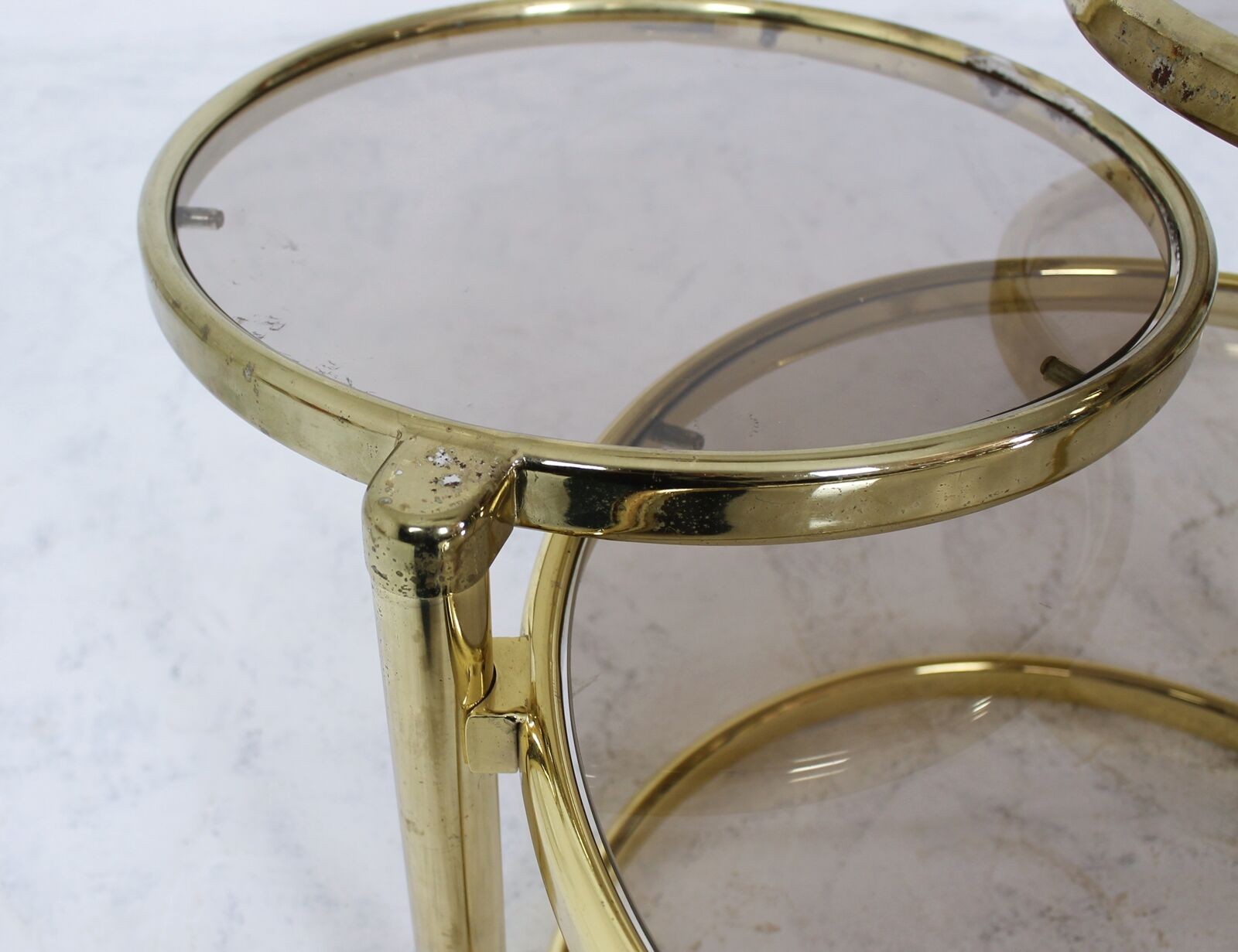 Mid century brass plated 3-tier swivel coffee table after Milo Baughman