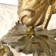 Pair of antique bronze candlesticks at the end of the table XIXth