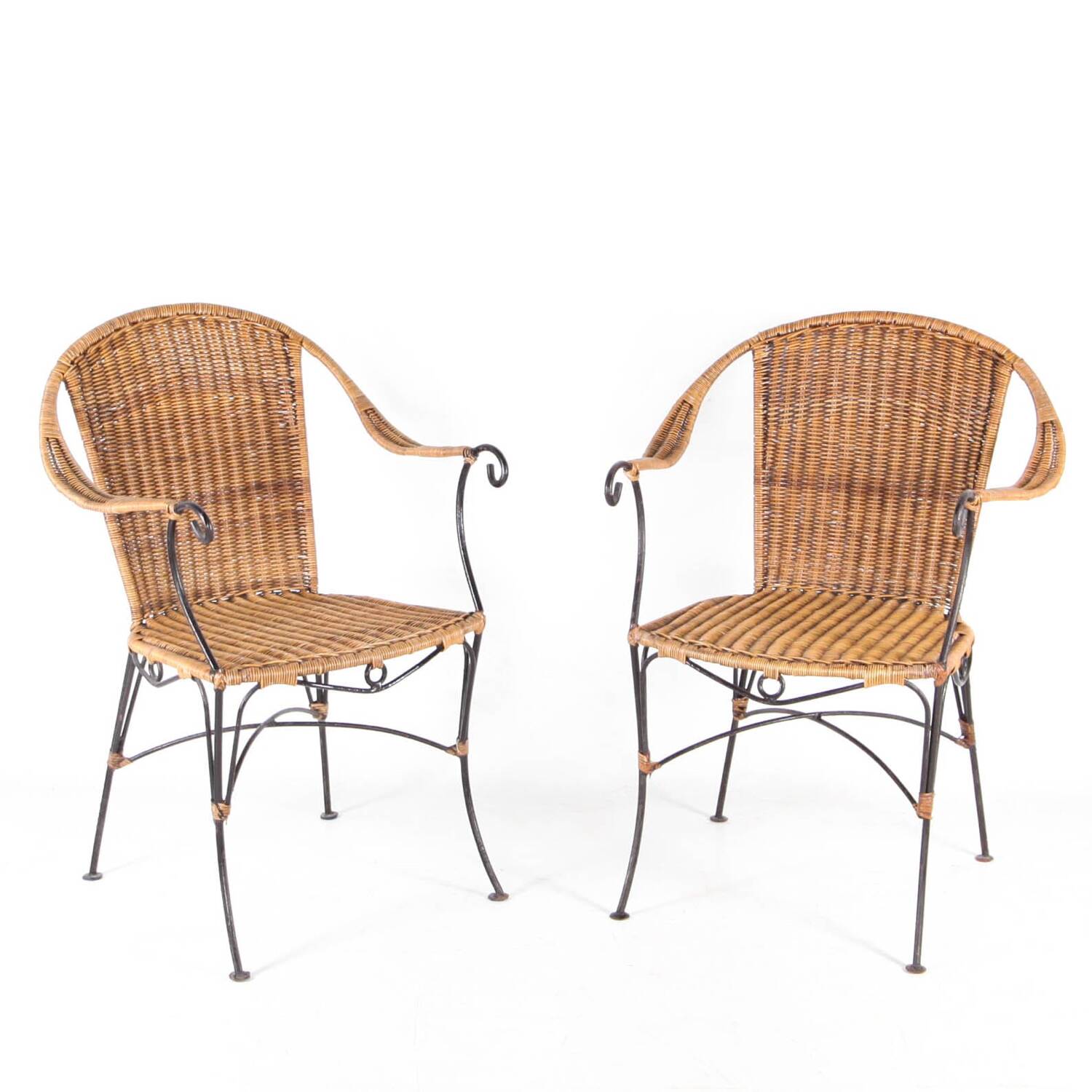 Pair of wicker and iron armchairs