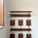 Vintage teak wall coat rack