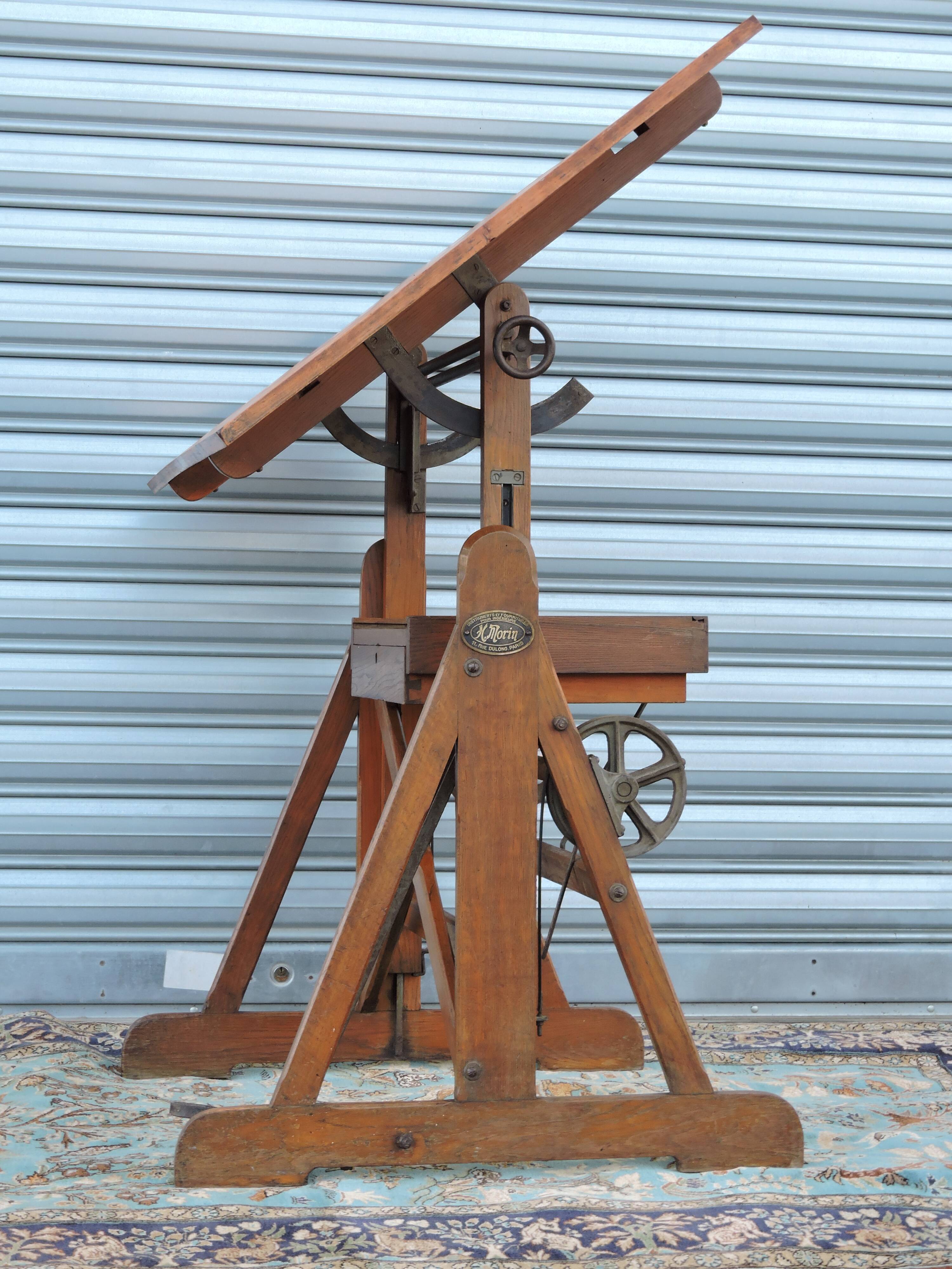 Architect's table has industrial adjustable design H Morin betting
