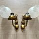 Pair of vintage wall sconces in brass and frosted engraved glass.