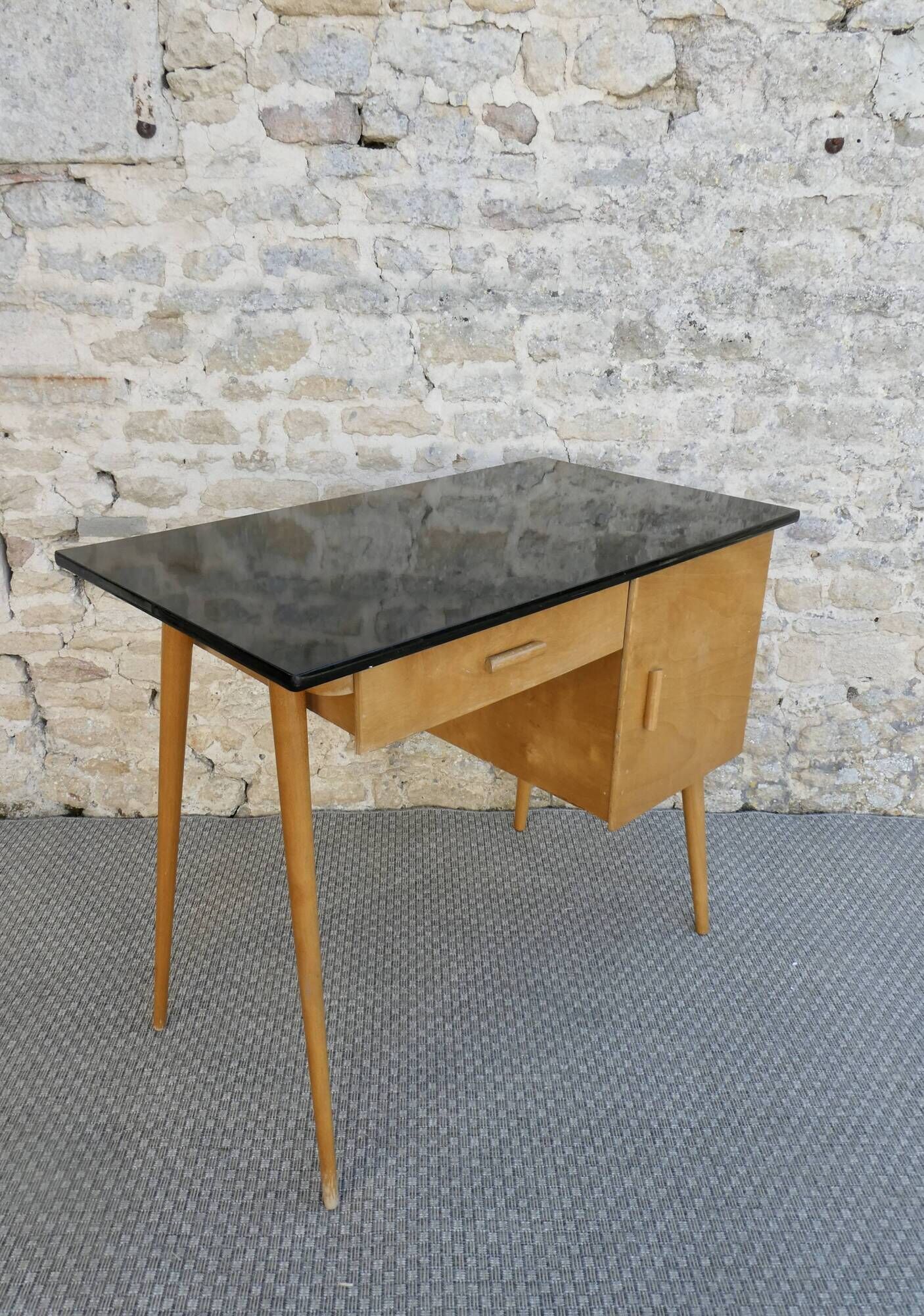 Baumann desk in light wood and black Formica, around 1960.