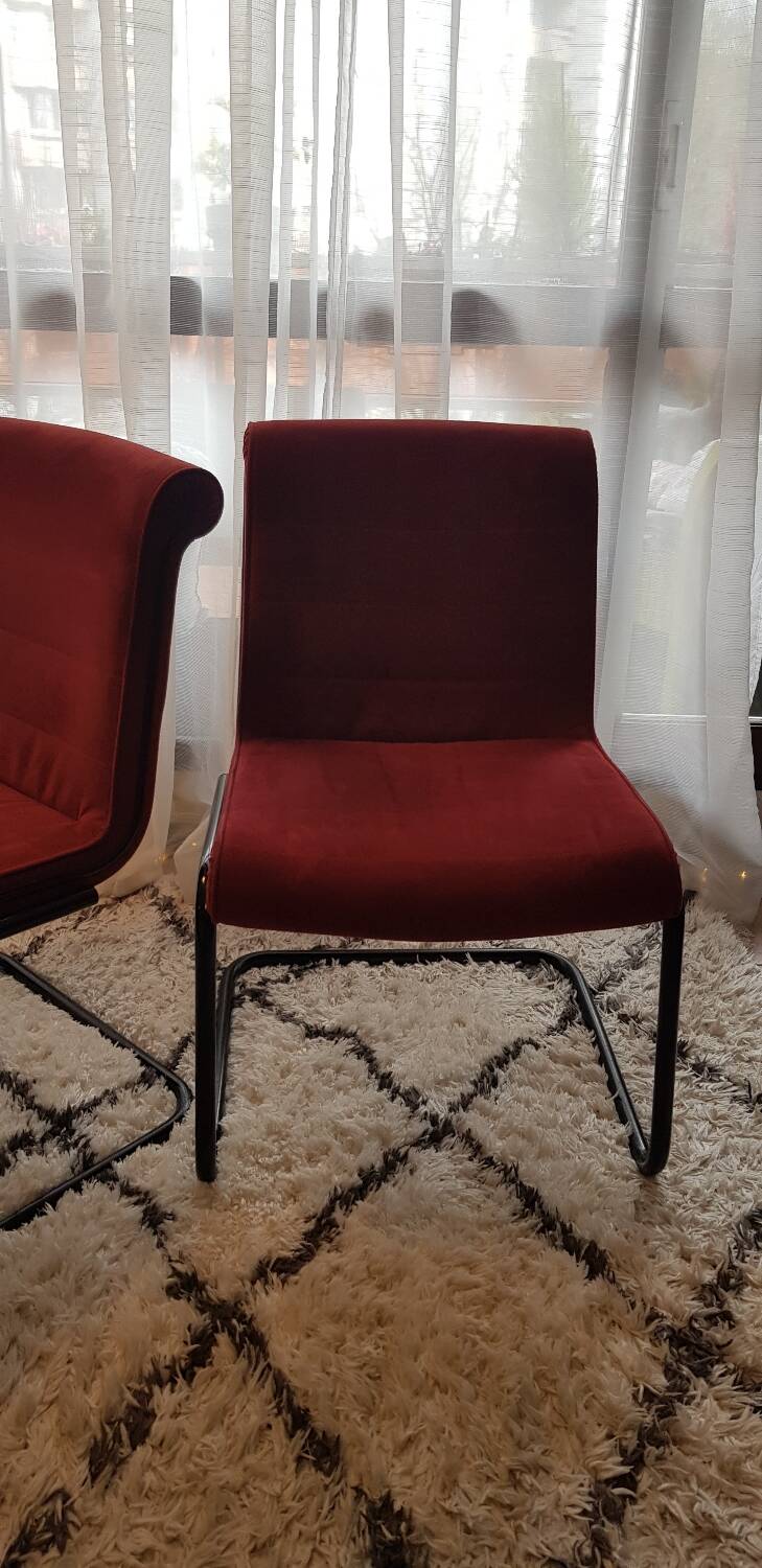 Red suede chairs, Knoll.