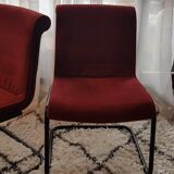 Red suede chairs, Knoll.