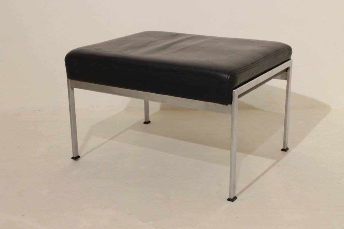 Pair of designer leather and brushed stainless steel footrests - Rob Parry