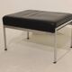 Pair of designer leather and brushed stainless steel footrests - Rob Parry