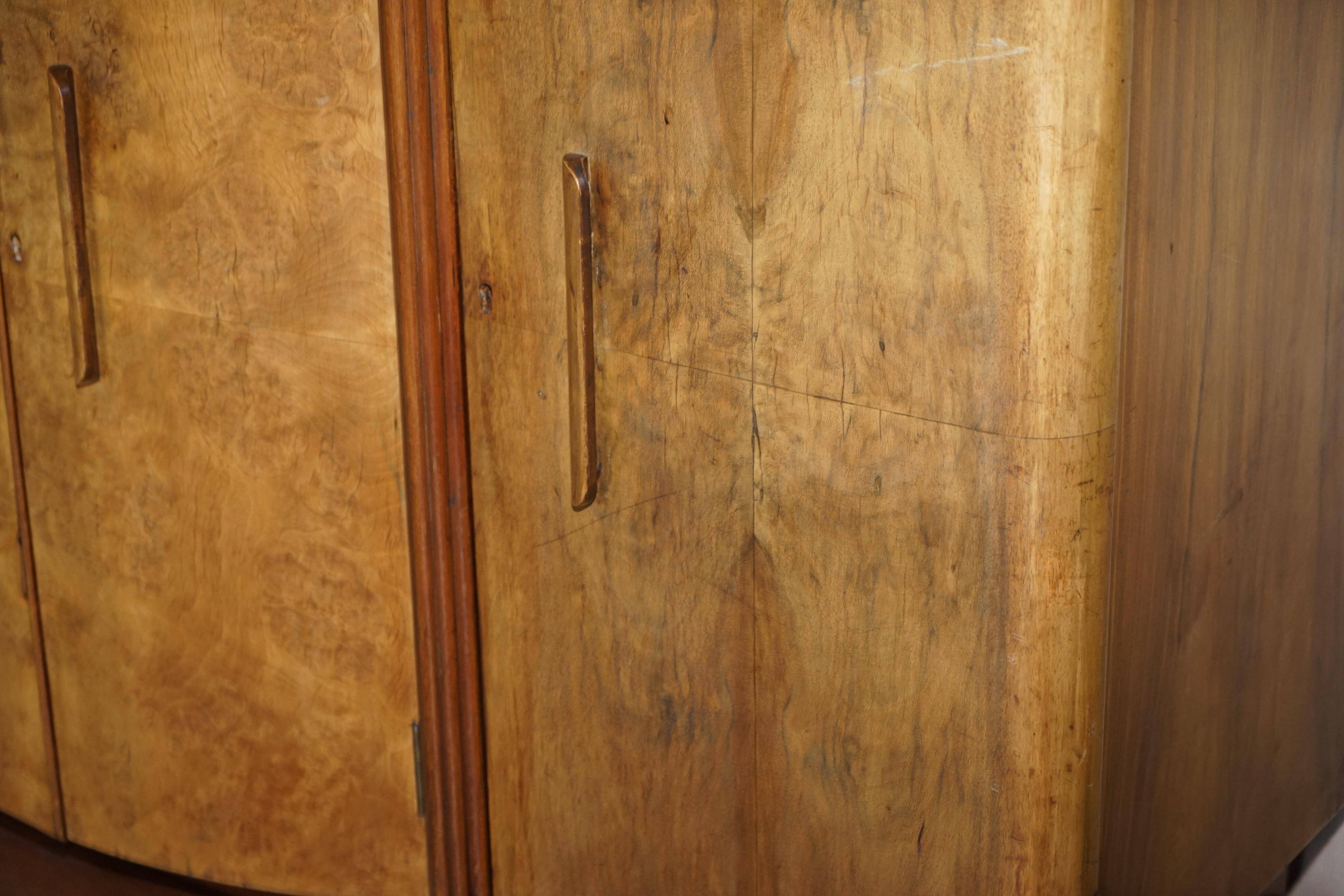 Art Deco walnut burr sideboard with drawers and bar.