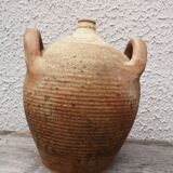 Old terracotta pot with two handles
