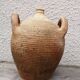 Old terracotta pot with two handles
