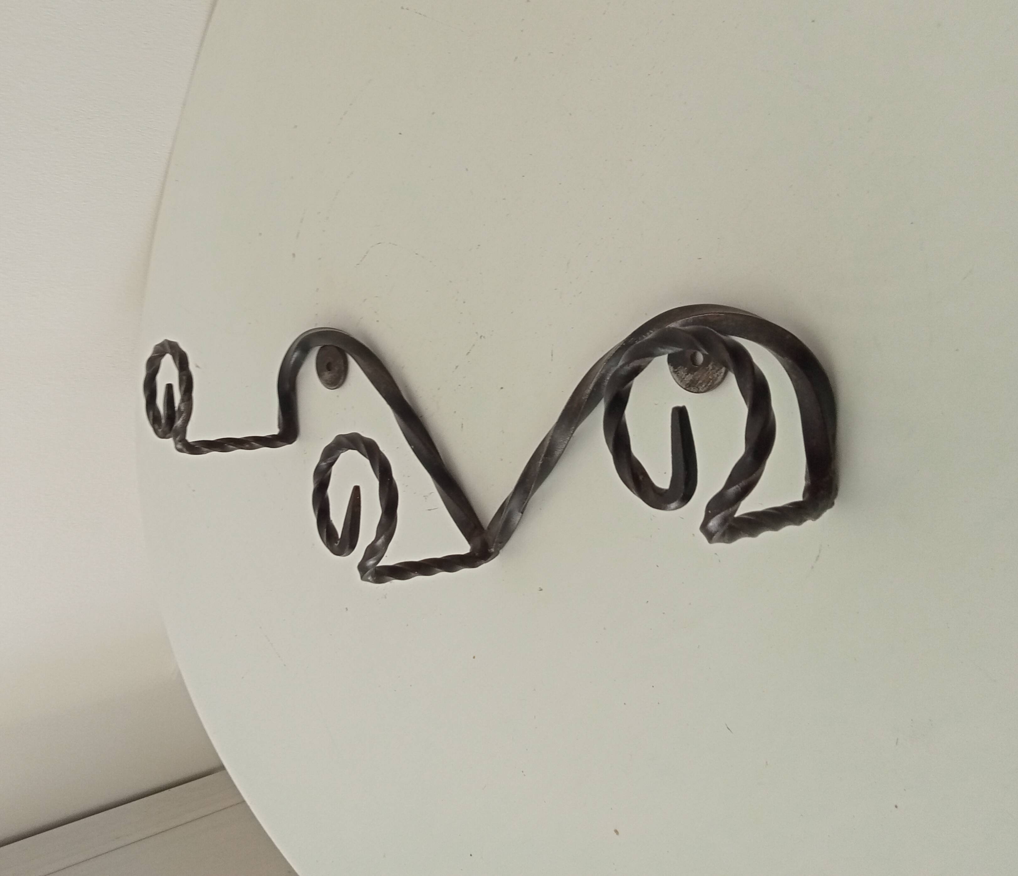 Vintage wrought iron wall coat rack