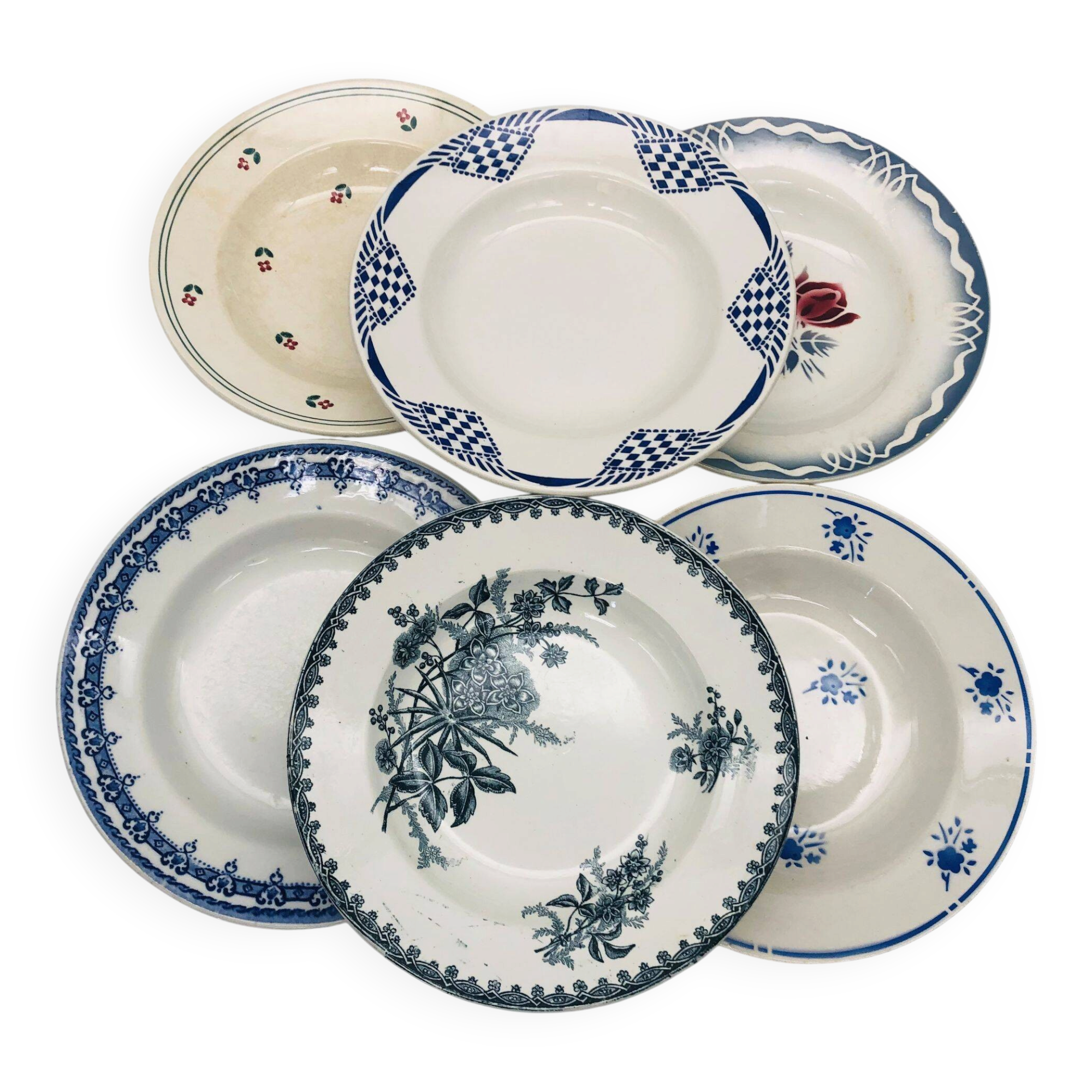 Set of 6 mismatched deep plates.