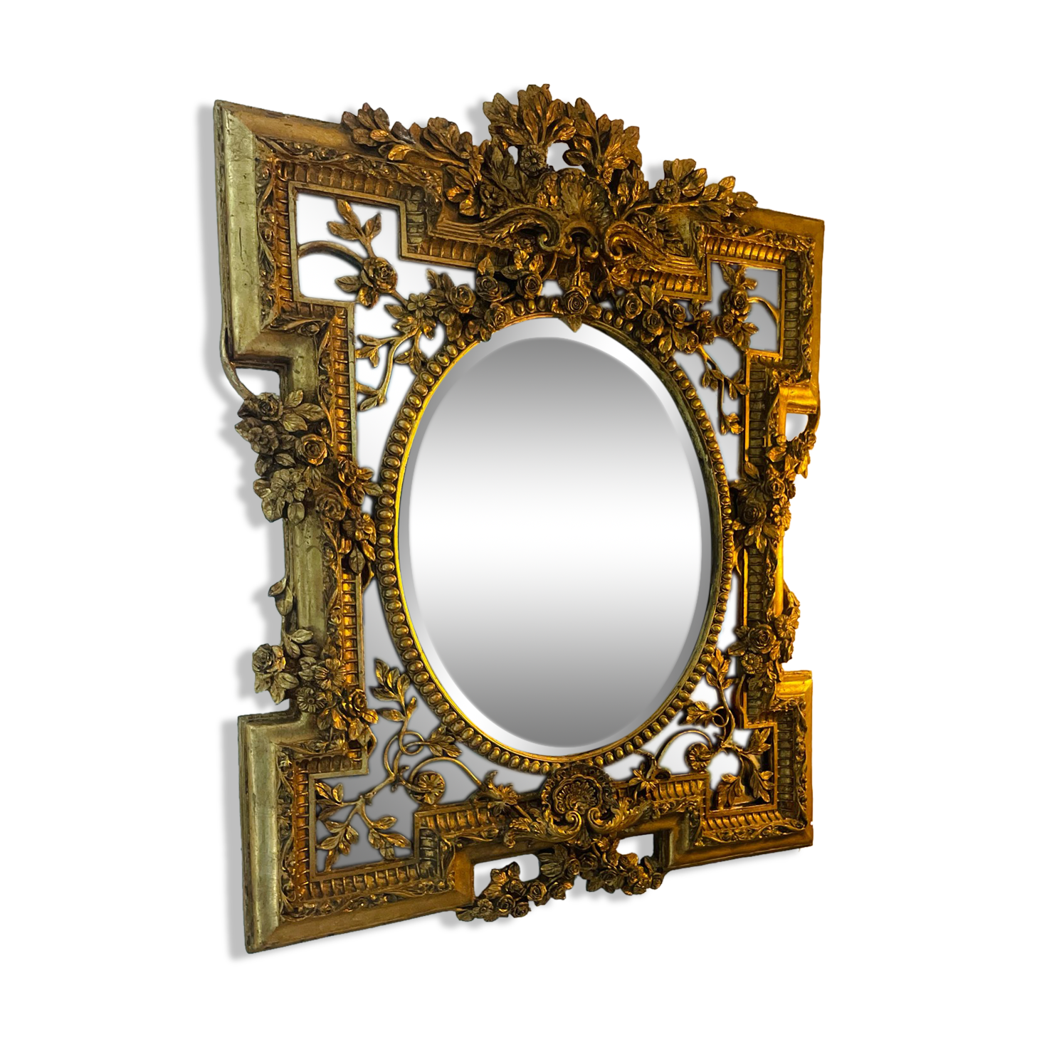 Antique mirror with gold leaf parecloses