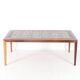 Set of coffee tables in rosewood and ceramic.