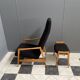 Highback chair with ottoman in black boucle