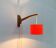 Mid-century cantilever wall lamp with a pivoting arm, 1960s.