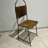Pair of vintage raw metal chairs