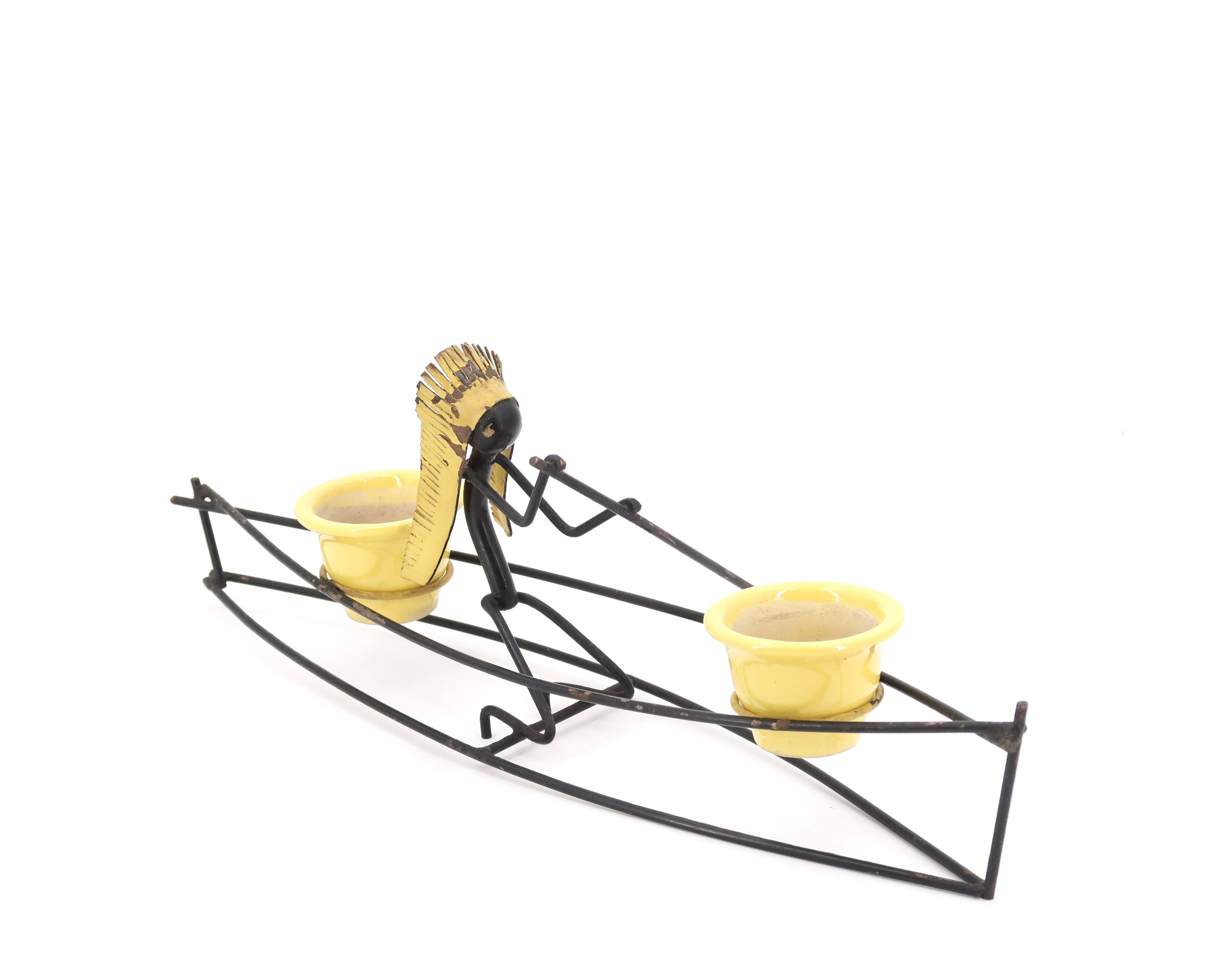 Ceramic flower pot in dugout with Indian, 1950s